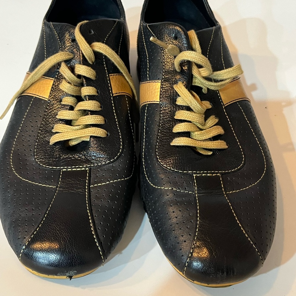 Cole Haan/Nike Air Black and Gold Sneakers